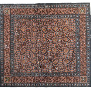 Hand-carved traditional Toraja house panel with authentic black and orange spiral Passura motifs from Sulawesi Indonesia